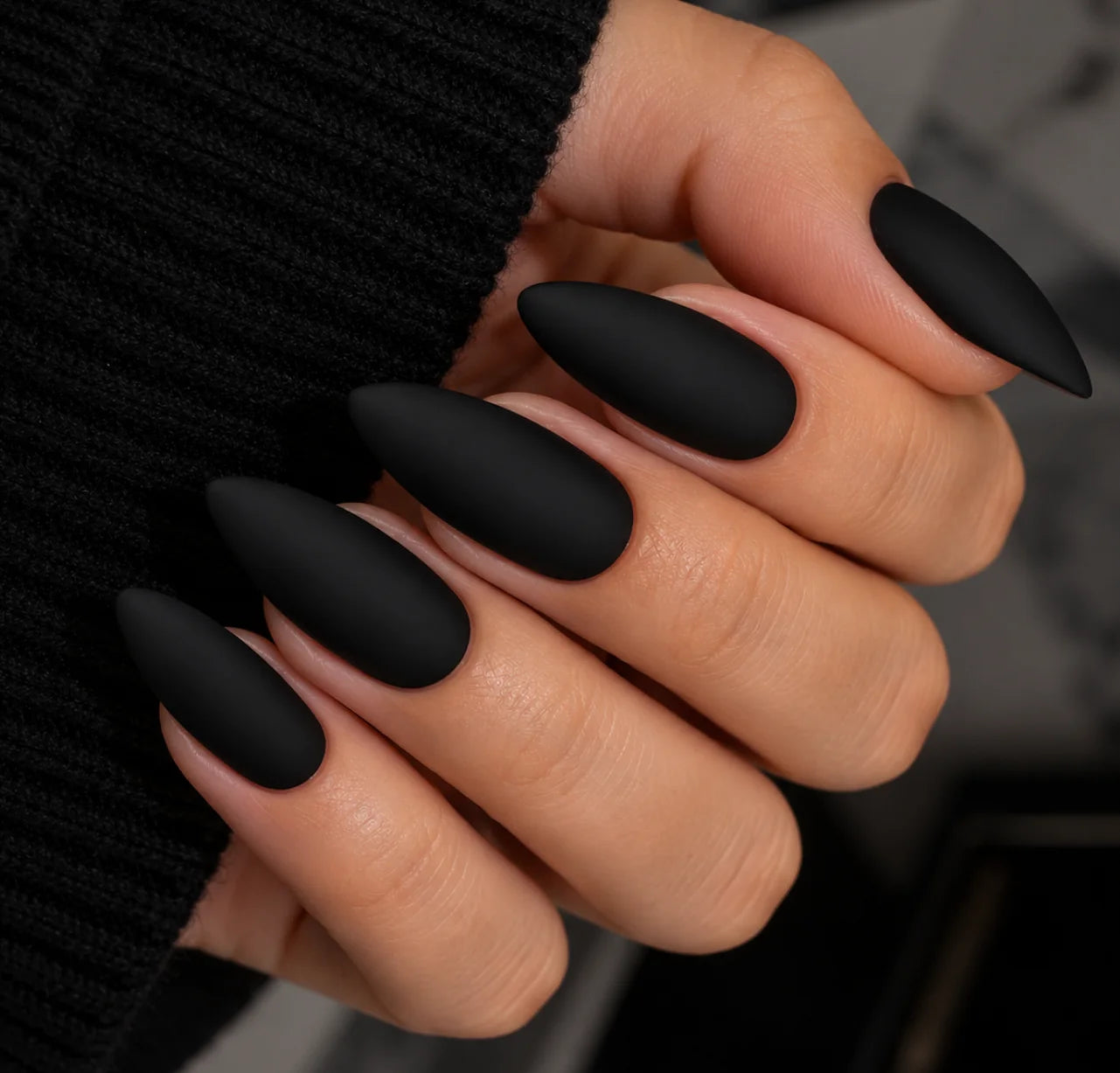 Matte black gel nails with a no-shine finish