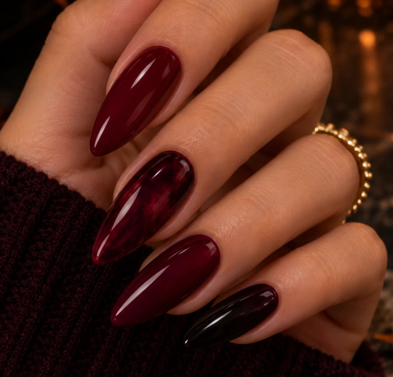 Glossy oxblood and black cherry gel nails