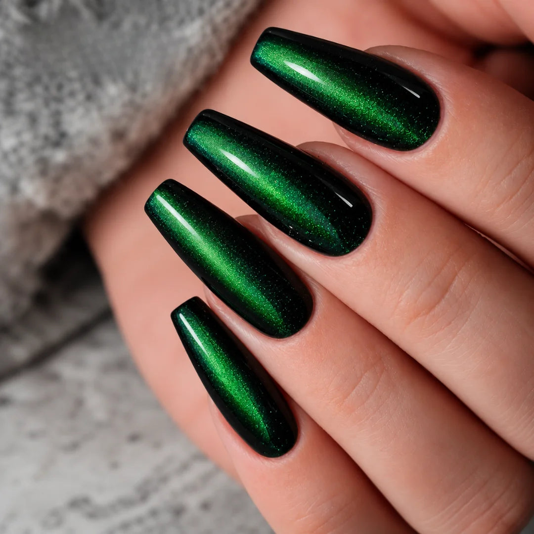 Witchy plum and forest green cat-eye gel nails