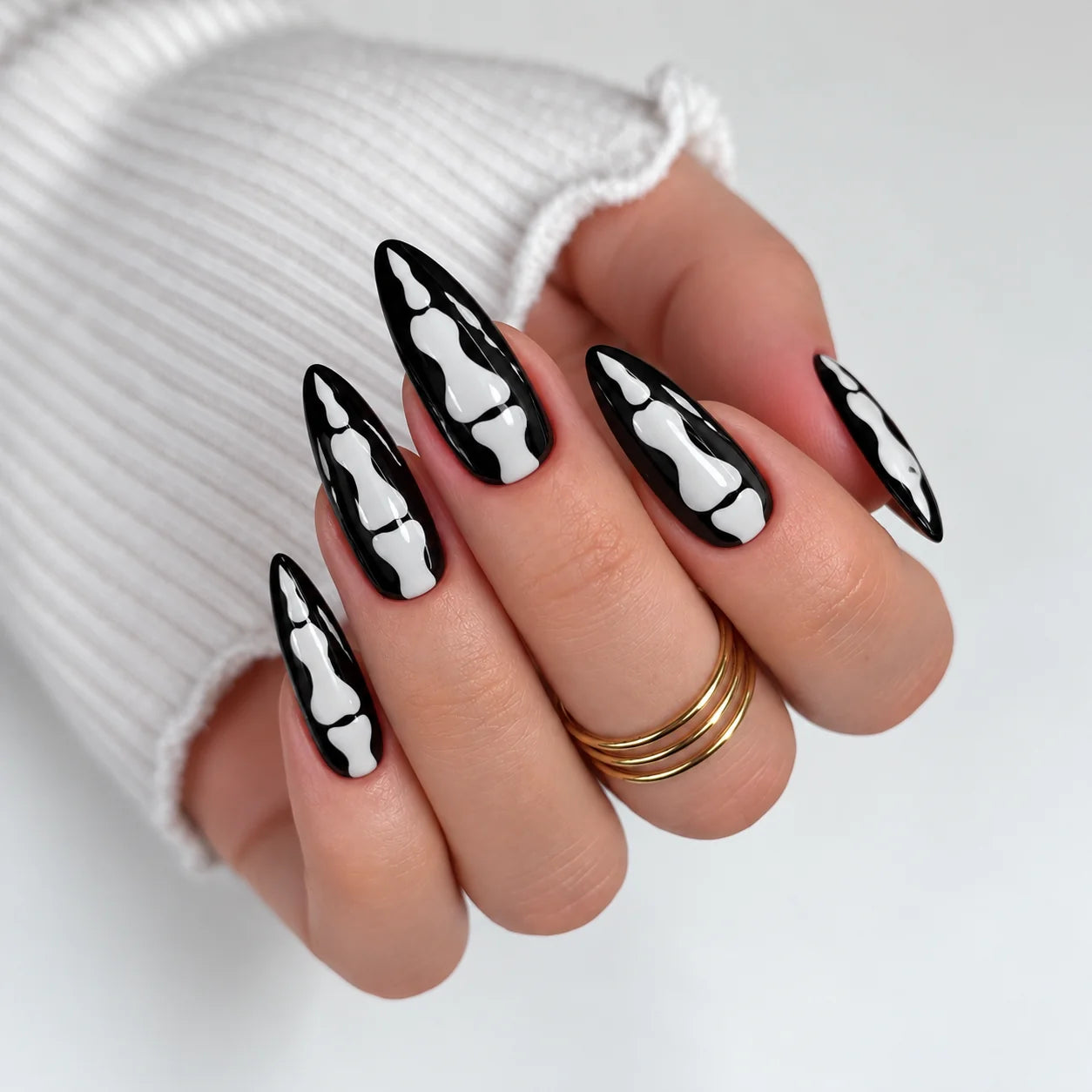 Skeleton hand ombré nail art on almond nails